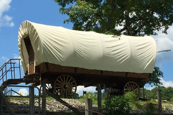 West Glam Frontier Glamping Covered Wagon