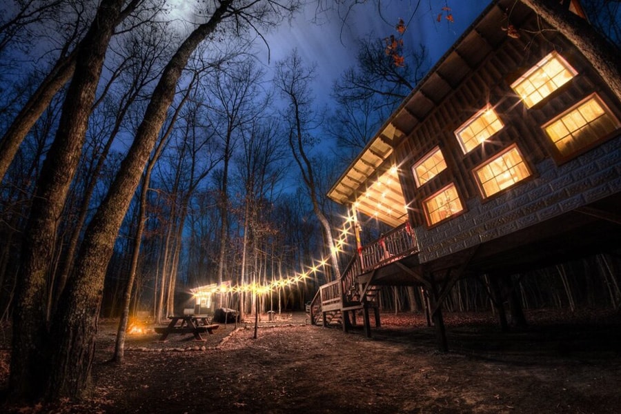 Glamping Tennessee at Deer Camp view of the camp with lights strung up at night
