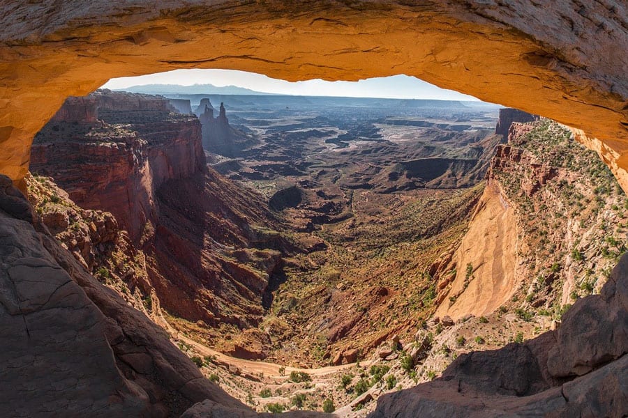 view of canyonlands through an arch