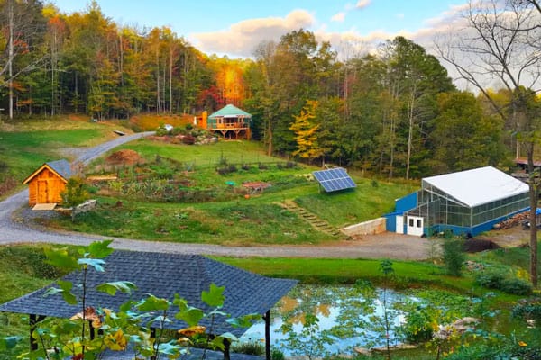 Cozy Yurt Asheville NC view of the property with yurt, greenhouse, solar, pond and gardens