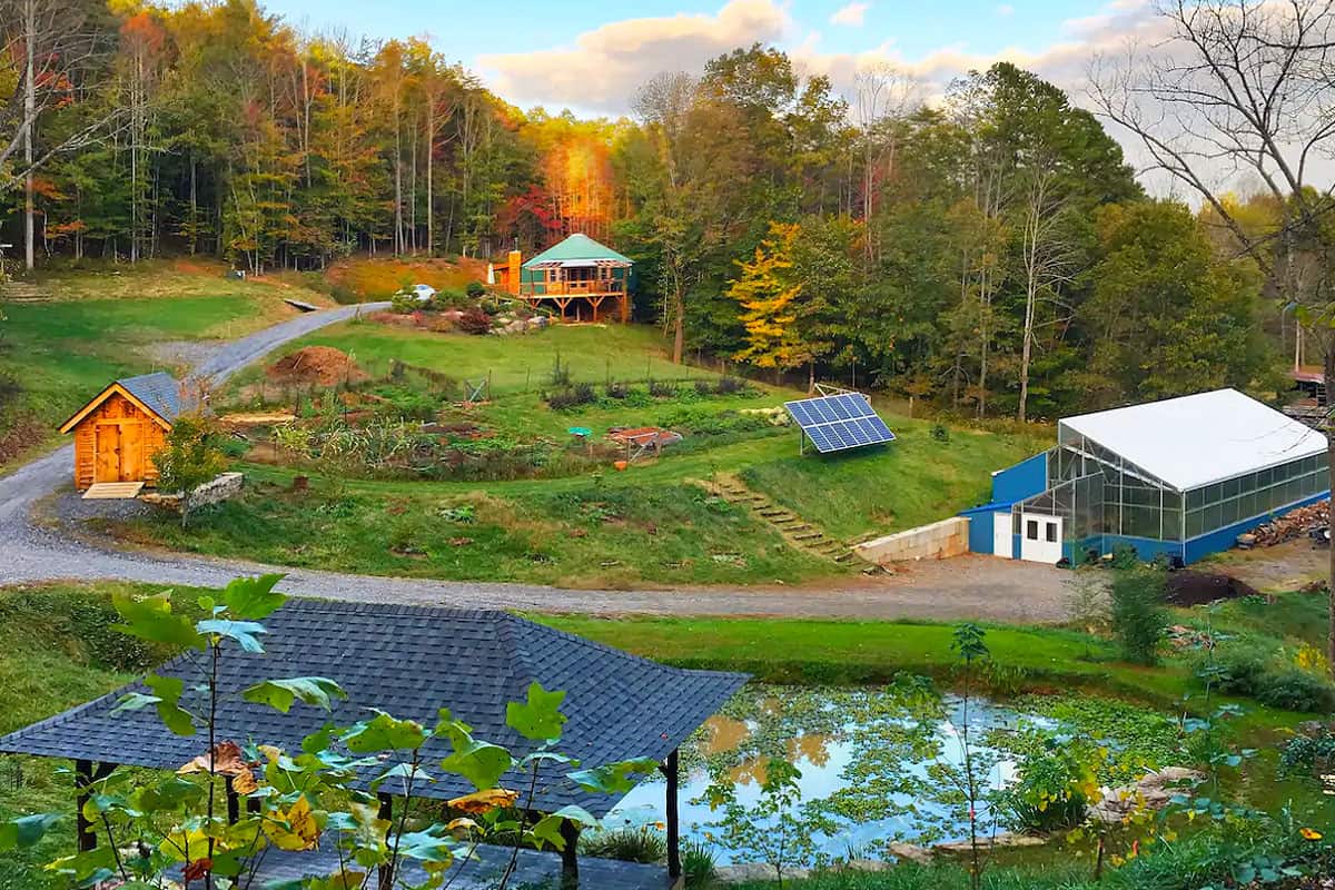 Best Yurts in North Carolina Pic of the Cozy Yurt Asheville view of the property with yurt, greenhouse, solar, pond and gardens