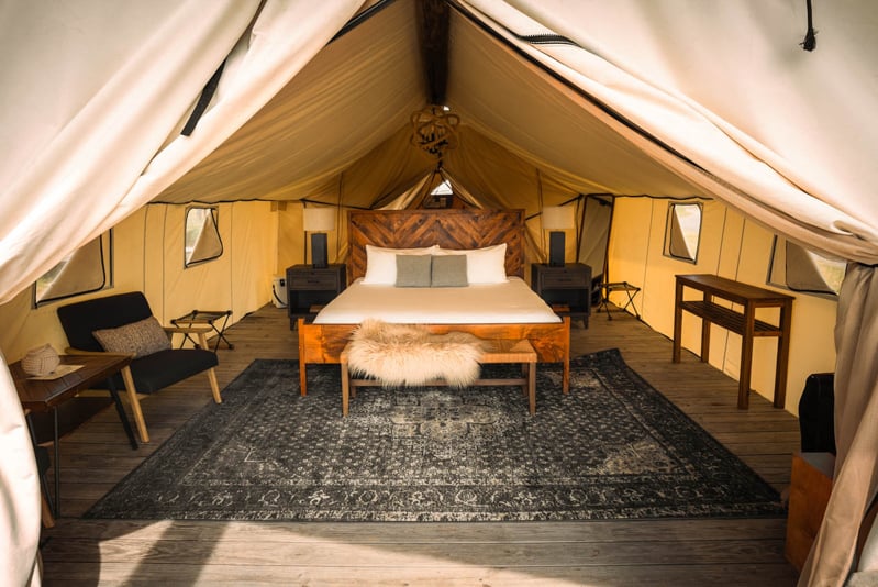 Inside the Summit Tent at Collective Retreats Governors Island glamping in New York City.
