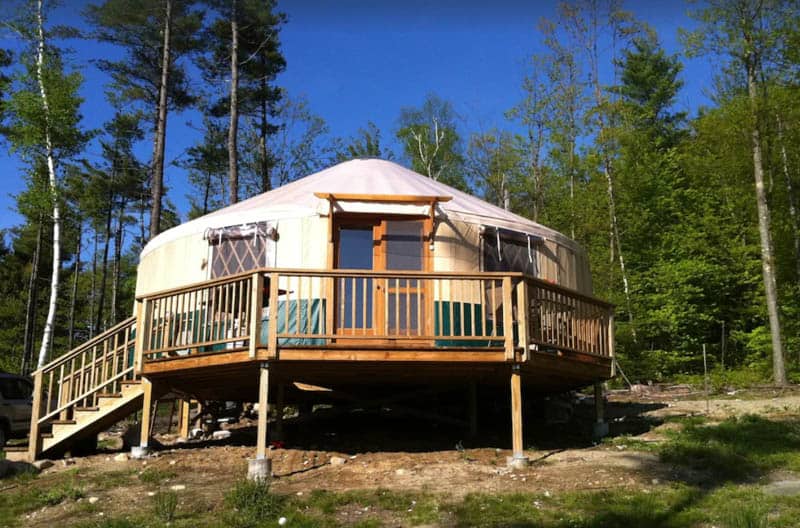 Yurt glamping tent on wooden deck