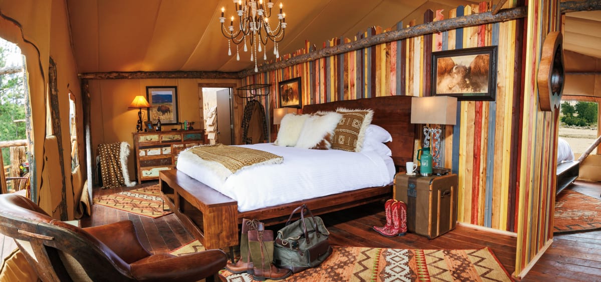 Luxury bedroom in Montana glamping tent 