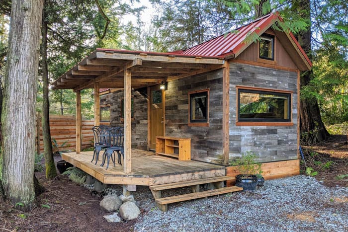 Tiny House in Salt Spring's Beautiful South End view of tiny home with deck in woods