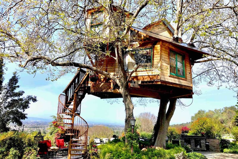 Glamping Treehouse Santa Jose California view of treehouse with spiral staircase and view of the valley