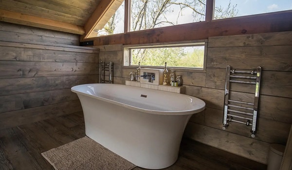 view of inside a glamping cabin with a tub